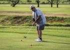 A golfer puts in extra time on the putting green at the Olney Country Club before the CEMCO Tourney gets underway. Photo by Will Sadler