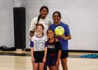 Former Ladycat Mya Cabrera [BL], LaTisha Jacoba [BR] Emory Shield [FL] and Brie Moulder, pose for a photo before beginning volleyball skills training. Photos by Will Sadler
