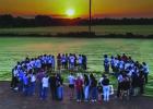 During the annual Senior Sunrise Rise gathering Seniors, parents and organizers gathered in a prayer circle to meditate on and pray over the seniors’ final year of high school. Photo by Will Sadler