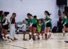 NHS Ladycats greet excited future Ladycat volleyball players before the matchup with the Eastland Lady Mavericks. Photo by Will Sadler