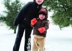 Left: 2-year-old Truett Jones experiencing his very first snow with big sister Morgan