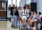 Coach Dollar goes over strategy during a timeout, against the rival Lady Greyhounds. Photo by Will Sadler