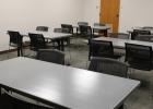 The conference/gallery room features new steel tables and plastic chairs for meetings, classes, or parties. Photo by Gina Keating