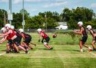 Cub offense works through drills. This season looks to include more passing, which should give this faster Cub team the edge, previous seasons counted on bigger players pushing the Veer offense. Photo by Will Sadler