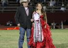Homecoming Queen nominee Braelyn Casteel and her father stand at midfield in Cub Stadium during the halftime show. Photo by Gina Keating