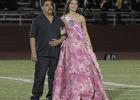 Homecoming Queen nominee Katy Rosales and her father promenade onto the field during halftime at the OHS Homecoming game at Cub Stadium on Sept. 18. Photo by Gina Keating