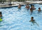 Coach Eric Symank celebrated the successful conclusion of summer basketball camp with a pool party at the Olney municipal swimming pool, which has seen a lot of use since the heat dome settled over the City this month. Photo by Will Sadler