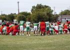 Players and Coaches from the Bobcat, Longhorn, and Yellowhammer scrimmage circle up for fellowship and prayer after the day’s matchup. Photo by Will Sadler