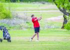 OHS Cub Luke Lane swings for the green at hole 2 at the Olney Country Clubs district competition. Photo by Will Sadler