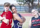 It’s not all work and competition at the Munday track meet: students from different schools have a chance to socialize, meet new friends and visit with friends already made from all over the district. Photo by Will Sadler