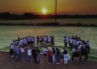 During the annual Senior Sunrise Rise gathering Seniors, parents and organizers gathered in a prayer circle for prayer for the year to come. Photo by Will Sadler