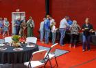 Attendees at The Refuge’s 10th Anniversary celebration lined up for barbecue from Fowler’s BBQ of Throckmorton, which donated its services. Photo by Will Sadler