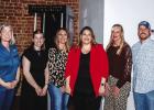 Chamber board members gather at the Olney Heritage Museum for the first Mix & Mingle networking event of 2026. L-R: Kris Kamp, Tatum Wiley, Kaylah Hampton, Kimberly Smith, Ronda Bretting, and Eric Loggins. Photo by Will Sadler