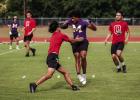 An Olney Cubs Varsity player tags a Munday receiver during a play at the 7 on 7 matchup. Photo by Will Sadler