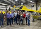 Congressman Roger Williams (in suit and tie, center) met with executives at Air Tractor and Olney leaders on Aug. 25 for a tour of the world’s largest turboprop maker and a town hall with its employees. Photo provided by Office of Rep. Roger Williams