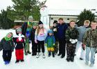 Newcastle Youth banded together to build a snowman in the schoolyard