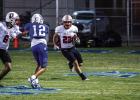 Cub running back #22 Kyle Stewart did what he could against a tenacious Bulldog defense. The Cubs made their best effort on the ground when passing was off for the night with many interceptions and incomplete passes. Photo by Will Sadler