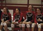 The Olney Lady Cubs battled Bellevue Lady Eagles on Sept. 16 and added another series to the win column. Standouts in the 3-1 victory were Bradi Bower (L), Morgan Simmons (Center) and teammates who cheered for the win. Photo by Angel Turner