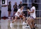 OHS Lady Club #24 Angel Turner plays with calm controlled aggression on defense keeping shooters on their toes. Angel scored 2 points for the night. Photo by Will Sadler