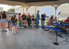 Friends, family gather for candlelight vigil for OHS student Avery Green