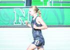 NHS Ladycat Allison Melton led the pack during the NHS Coal Mine Relays on the 3200, earning the first-place finish. Photo by Will Sadler