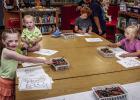 The art station was a popular spot inside the Olney Library during the annual pet show. Photo by Will Sadler