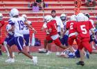 OJH Cub quarterback #1 Santiago Hernandez rolled left out of the pocket and blasted through Plowboy defenders on his way to the end zone for six! Photo by Will Sadler