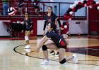 OJH Lady Cub #23 Caroline Stewart gets low to dismantle a kill shot from an opposing Lady Indian. Photo by Will Sadler
