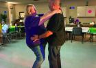 The Olney Senior Cub Center sponsored a 1960s-themed dance, following the success of previous dances organized by outgoing activities director Candy Blair. Here, Chris and Heather Garcia hit the floor at the Cub Center on Friday, Sept. 19. Photo by Candy