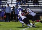 Cub defender #24 Pedro Carrion scrambled through Bulldog defenders making a tackle for loss on the Bulldog runner. Photo by Will Sadler
