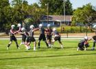 The Bobcats begin practice with special teams working in plenty of kickoffs and extra point kicking. Kicking should be automatic once the ball is hiked and plenty of repetition helps to ensure smooth kicks. Photo by Will Sadler