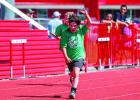 Cotton Gibson sprinting towards the finish line displaying the number three, maybe for third place or third grade, only Cotton will know. Photo by Will Sadler