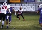 Cub #13 Reggie Williams returns the kickoff during the district game with the Bulldogs. Photo by Will Sadler