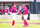 OHS Cub catcher #4 Case Gray dry’s off the ball for pitcher #11 Tucker Cortinez and maybe a joke to ease tensions at the mound. Photo by Will Sadler