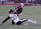 Cubs #2 Jamarcus Collins is brought down by an Archer City defender during one of several receptions from quarterback Tucker Cortinez in the Sept. 18 Homecoming game at Cub Stadium. Collins was recognized as the Scout Team Player of the Game. Photo by Gin