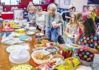 There were plenty of treats and food to keep dancers’ energy up during the Cub Center’s 80s-themed dance party, thanks to a potluck provided by attendees. Photo by Will Sadler