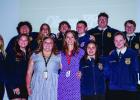 OHS FFA students pose with outgoing FFA teacher Haylee Haralson at the end of the end of year banquet. Photo by Will Sadler