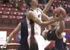 Olney High School senior guard Carson Fite puts in a layup during the first half of a game against Jacksboro.