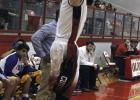 Olney senior guard Carson Fite drains a 3-pointer against Munday.