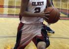 Olney High School senior guard Malik Garza adds to the Cubs' lead against Munday.