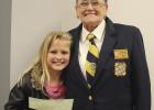 On left is Olney Junior High School seventh-grade student Lorelei Perry-Church posing for a photo with her $250, VFW Post 8567 Patriot Pen Contest first-place check, alongside VFW Post 8567 Commander Linda Muggenborg.