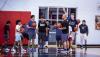 OHS Cub Head Basketball Coach Eric Symank instructs young basketball camp attendees on the rules of one of many skill building games for the day. Photo by Will Sadler