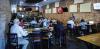 Members of the Olney Chamber of Commerce gathered at Hudson’s on Main on Monday, July 27 for a lunchtime seminar on using Aritifical Intelligence in business. Photo by Will Sadler