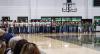 Bobcat football players, Ladycat volleyball players, and cheerleaders line up in the gym preparing to take the traditional walk through the Bobcat blowup. Photo by Will Sadler