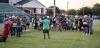Newcastle ISD Athletic Director and Head Bobcat Football Coach Asiah Archer goes over the importance of the annual tradition of Tackle with Moms. Coach Archer said in part that the event helps show what players go through during practice. Photo By Will Sa