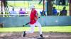 Young athletes like KP Patterson at bat are getting the opportunity to gain valuable experience over the summer by playing alongside older more experienced players. Photo by Will Sadler